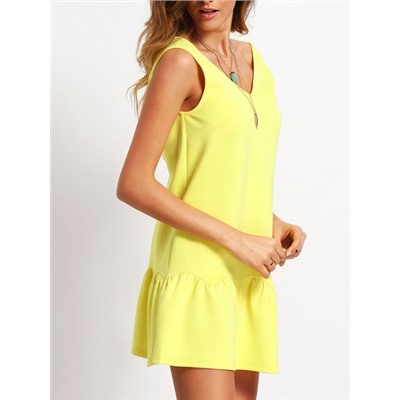 Жёлтое модное платье с воланами и открытой спиной