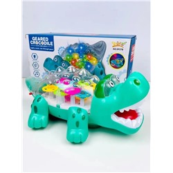 Развивающая игрушка Прозрачный Крокодил с шестеренками со световыми и звуковыми эффектами 27см