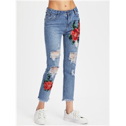 Модные джинсы с разрезами и цветочной вышивкой