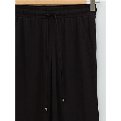 Женские брюки из вискозы с эластичной резинкой на талии и карманами